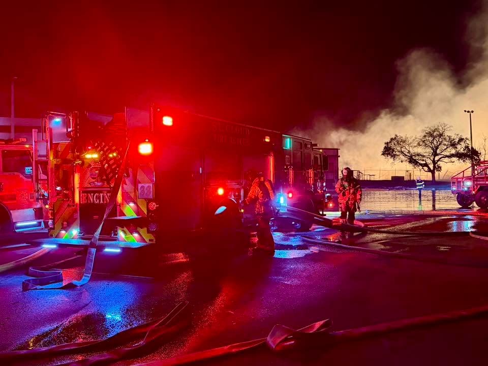 St. Cloud Fire Rescue engine on scene at a nighttime structure fire